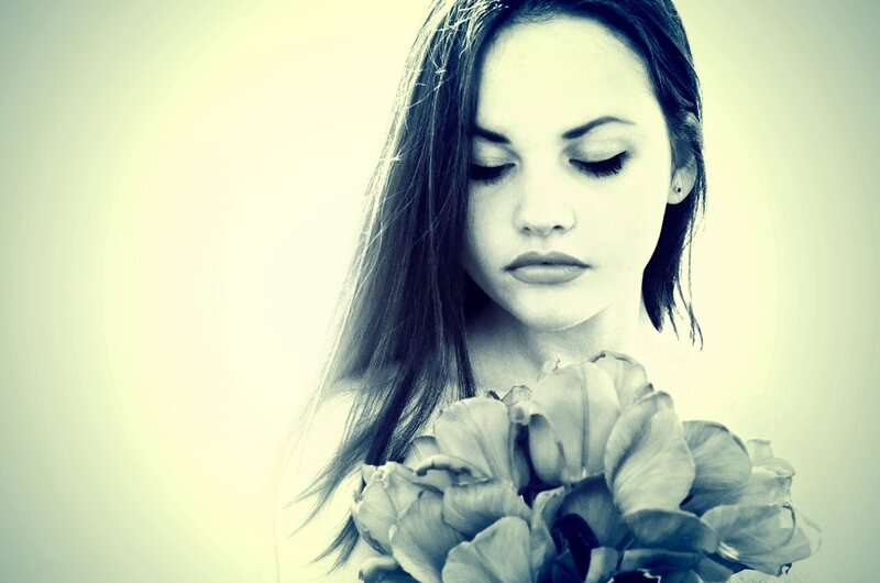 woman holding flowers