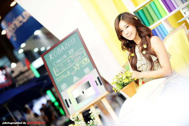 Woman holding flowers at event