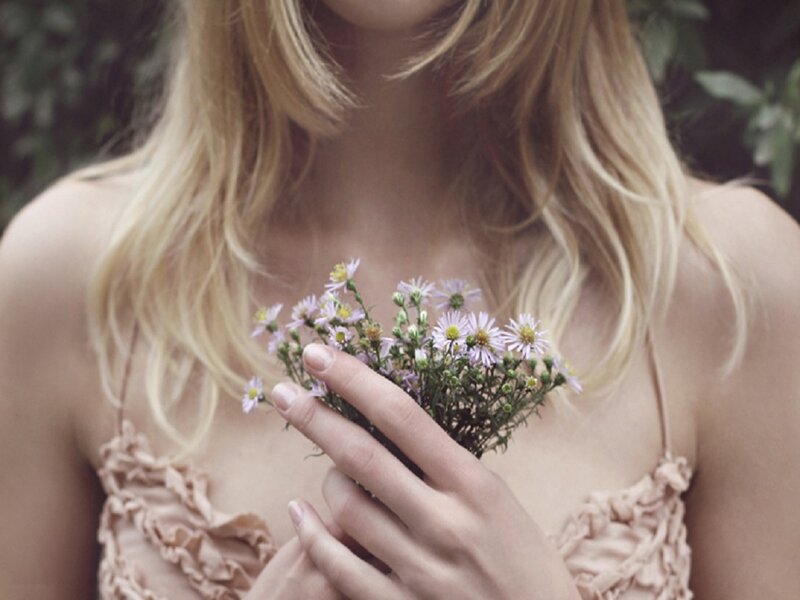 Woman Holding Flowers — Beige, Serene
