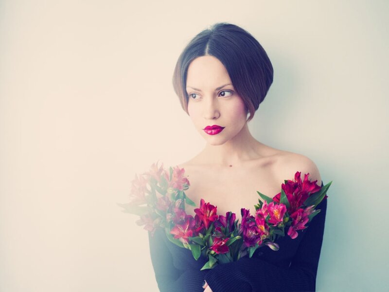 Woman Holding Flowers — Black, Calm