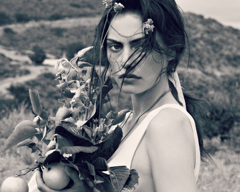 Woman Holding Flowers — Black, Dramatic, Photograph, Fruit