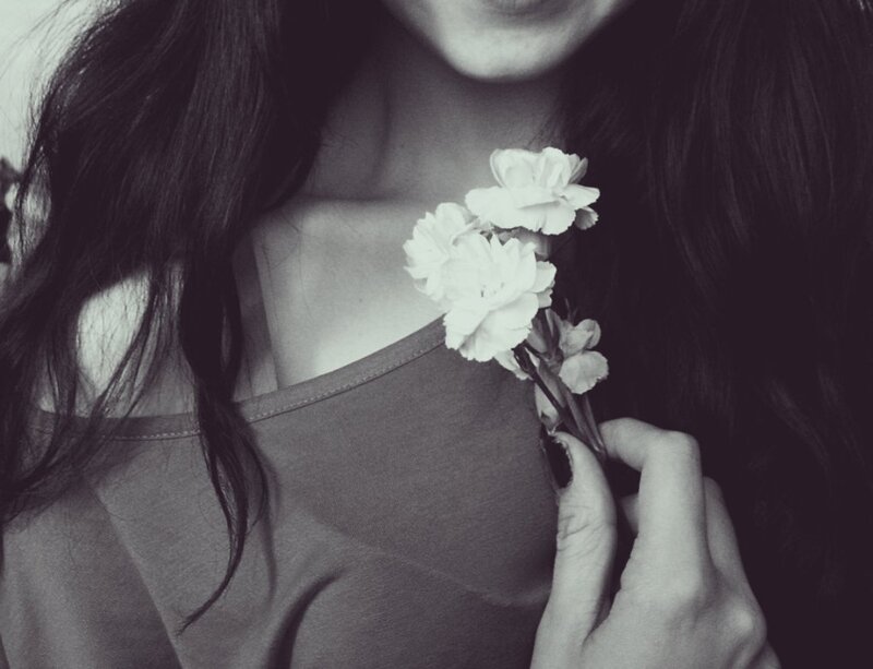 Woman Holding Flowers — Black, Serene, Photograph, Hand