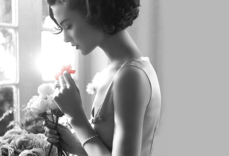 Woman Holding Flowers — Black, Serene