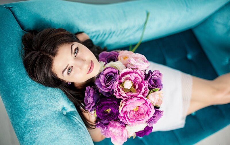 Woman Holding Flowers — Blue, Calm, Photograph
