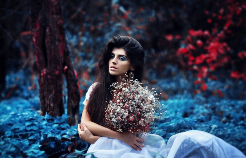 Woman Holding Flowers — Blue, Dramatic, Photograph