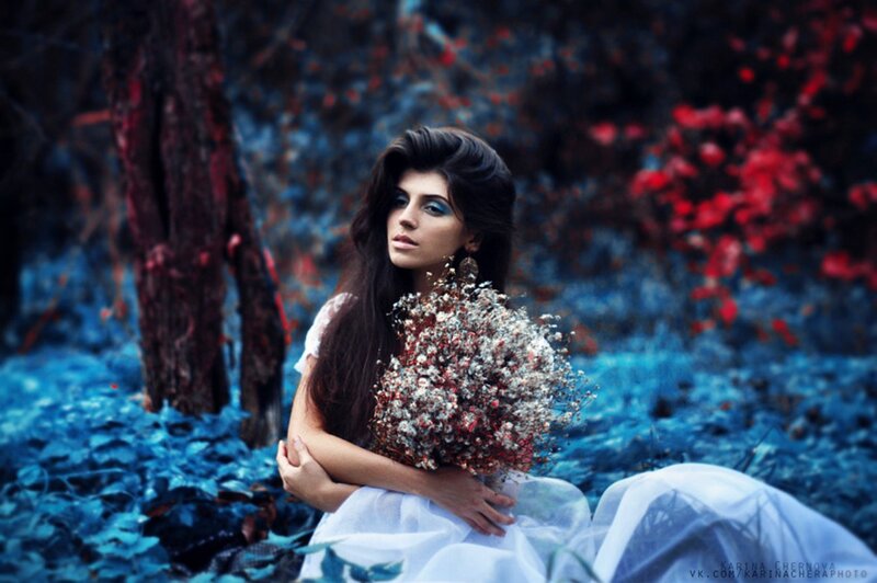 Woman Holding Flowers — Blue, Dramatic