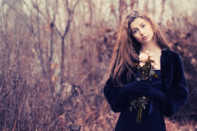 Woman Holding Flowers — Blue, Melancholic, Autumn