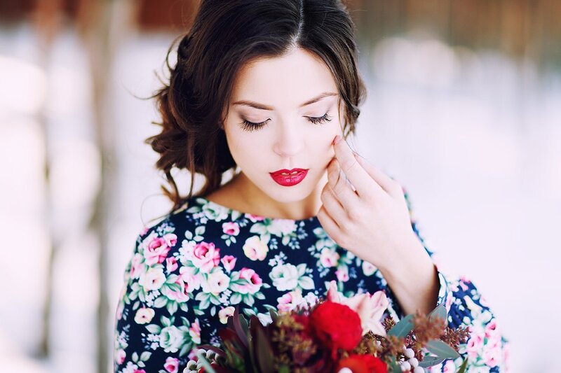 Woman Holding Flowers — Blue, Serene, Winter, Photograph