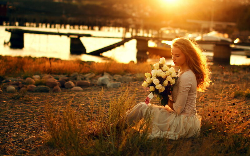 Woman Holding Flowers — Gold