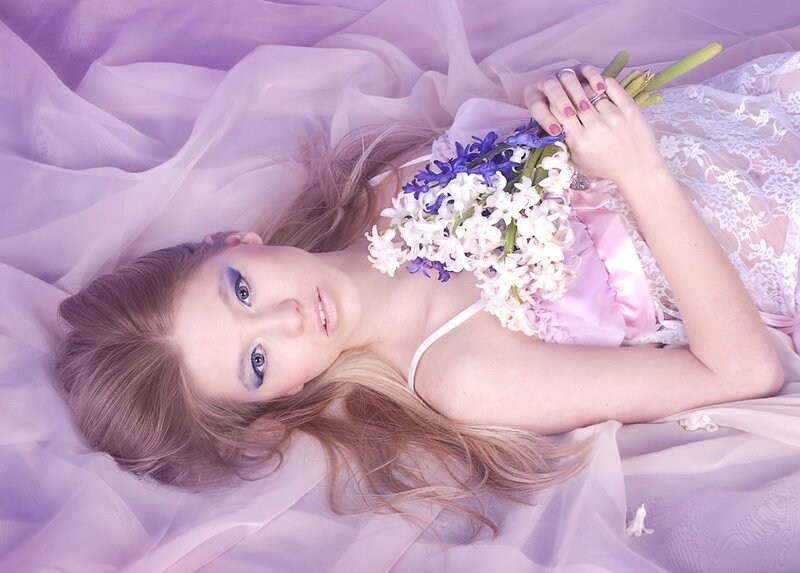 Woman Holding Flowers — Purple, Serene, Photograph