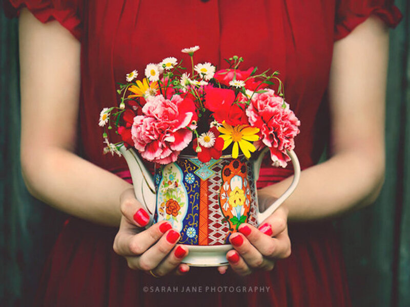 Woman Holding Flowers — Red, Calm