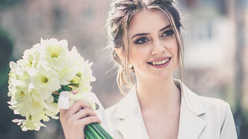 Woman Holding Flowers — White, Happy, Spring