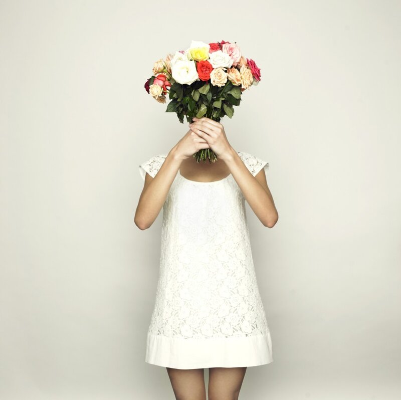 Woman Holding Flowers — White, Neutral, Photograph