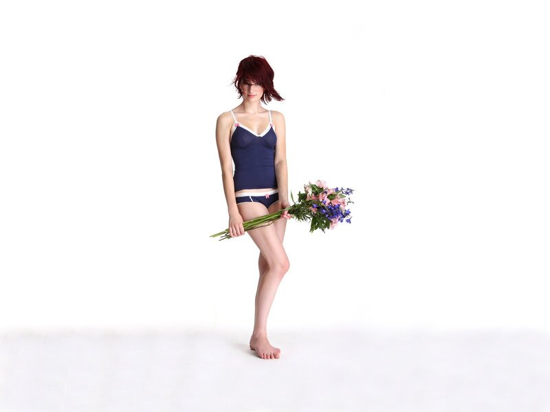 Woman Holding Flowers — White, Neutral, Photograph, Underwear