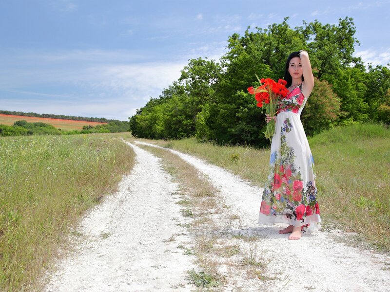 Woman Holding Flowers — White, Serene, Afternoon, Photograph