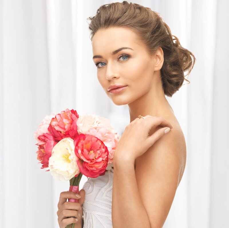 Woman Holding Flowers — White, Serene, Photograph