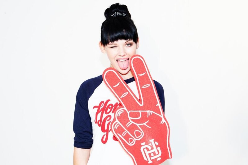 woman holding foam hand