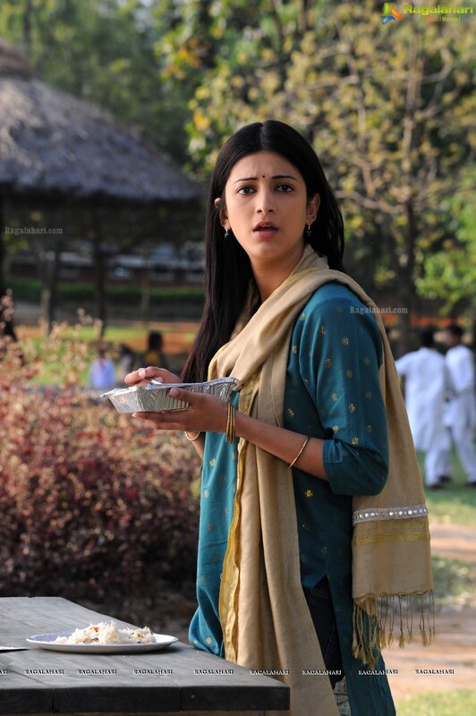 woman holding food outdoors