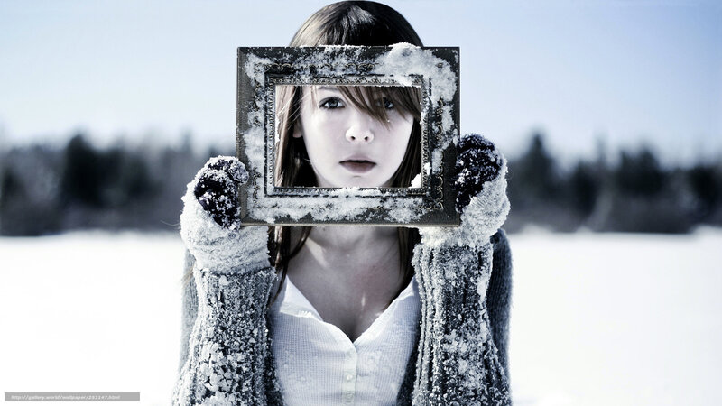 woman holding frame in snow