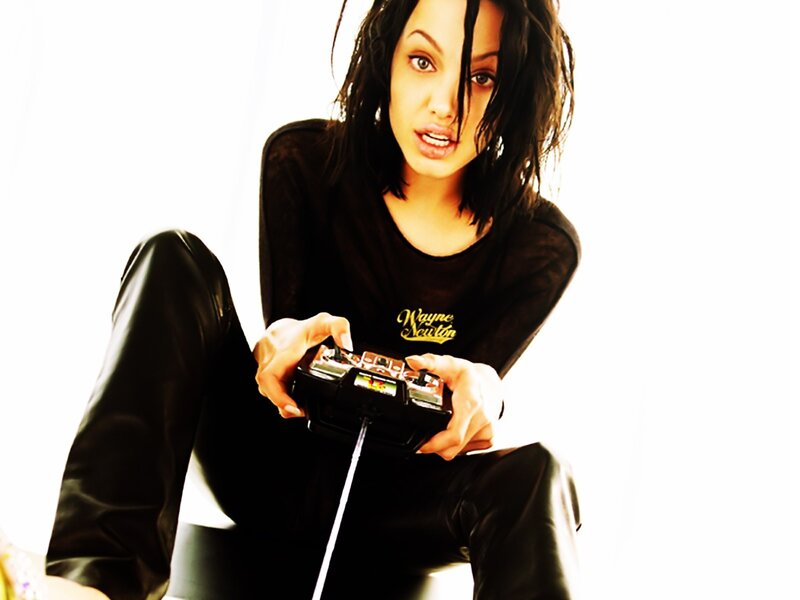 woman holding game controller