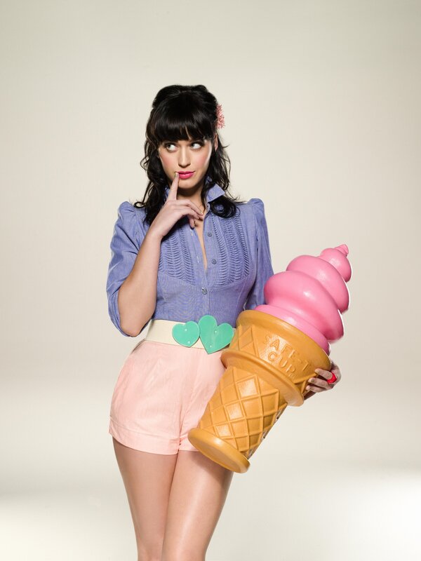 woman holding giant ice cream cone