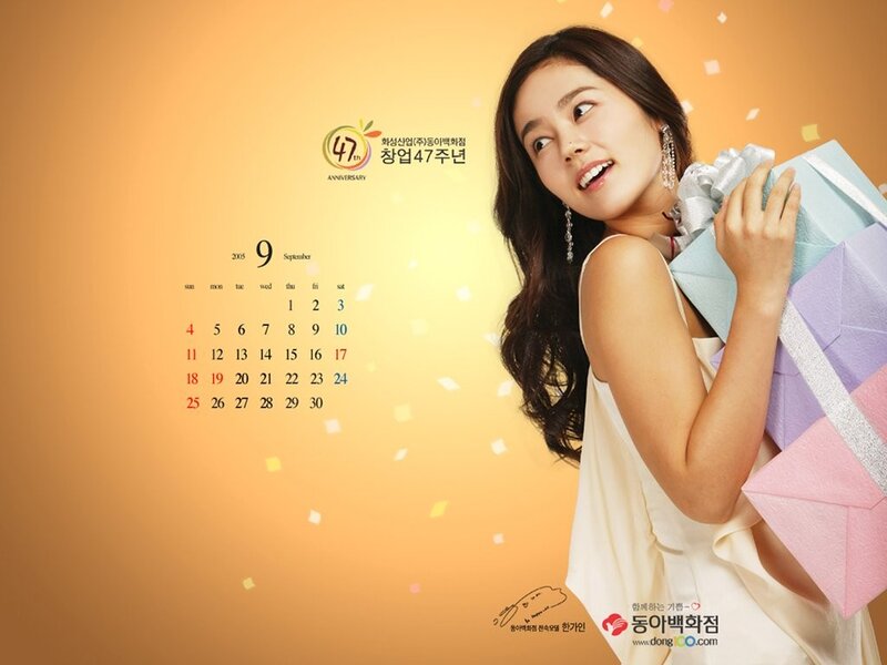 woman holding gift bags