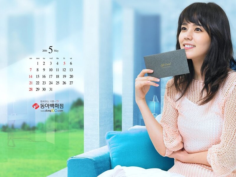 Woman holding gift card
