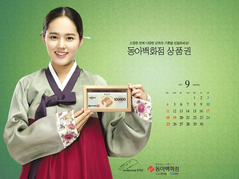 woman holding gift voucher