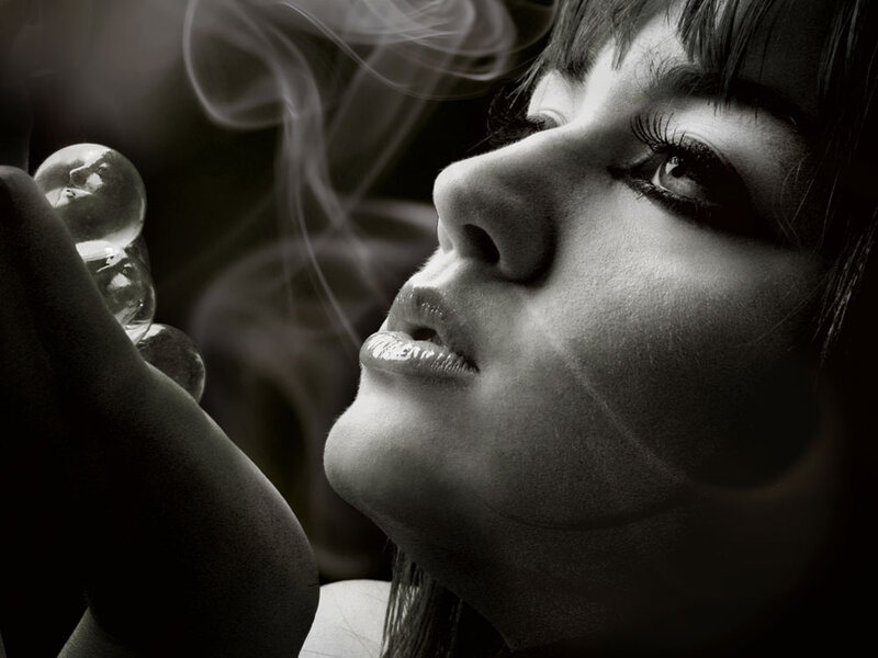 Woman Holding Glass Balls
