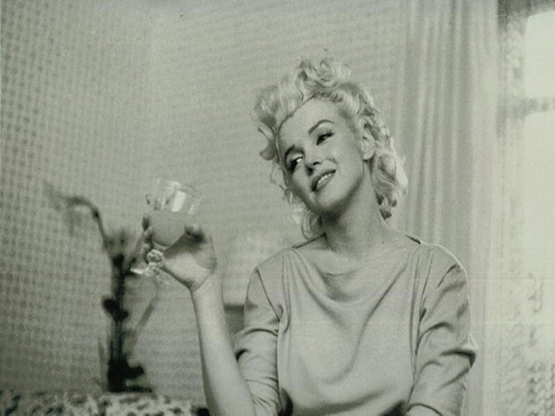 Woman Holding Glass — Black, Relaxed