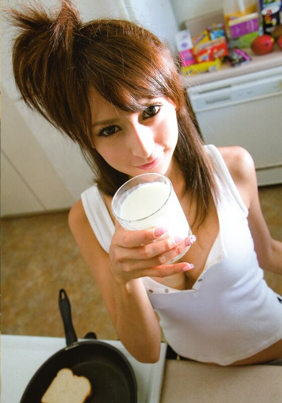 woman holding glass of milk
