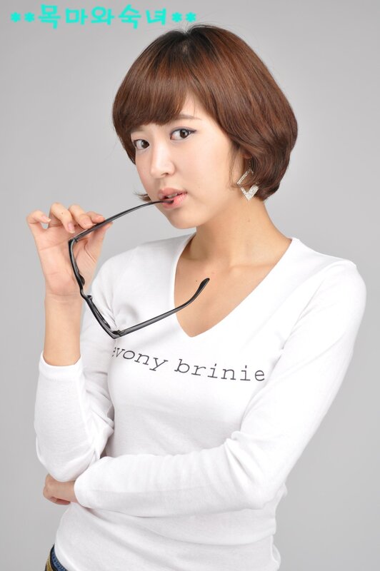 woman holding glasses