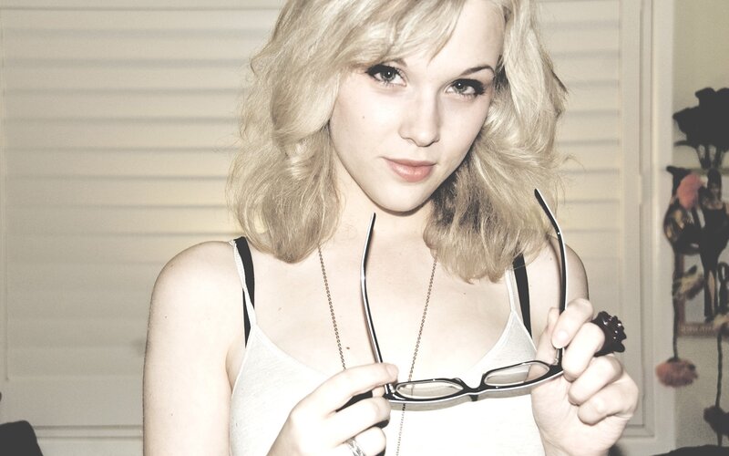 Woman Holding Glasses — White