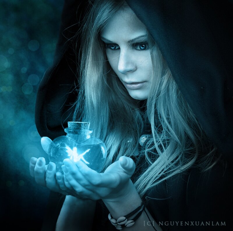 Woman Holding Glowing Bottle