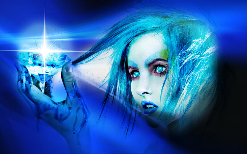 Woman Holding Glowing Crystal — Blue