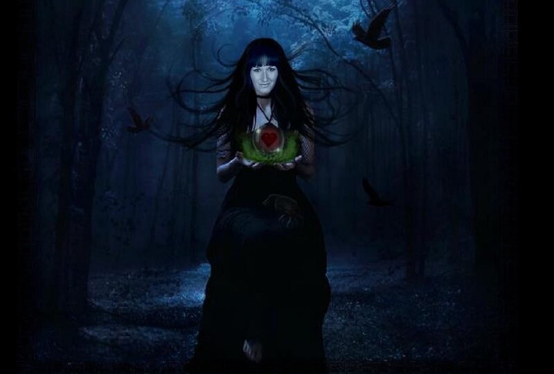 Woman Holding Glowing Heart — Blue