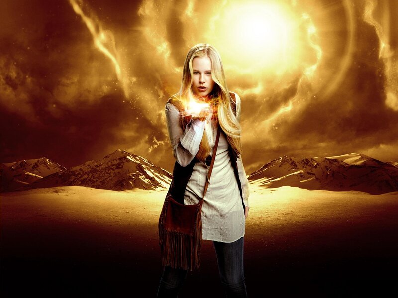 Woman Holding Glowing Orb — Gold, Dramatic