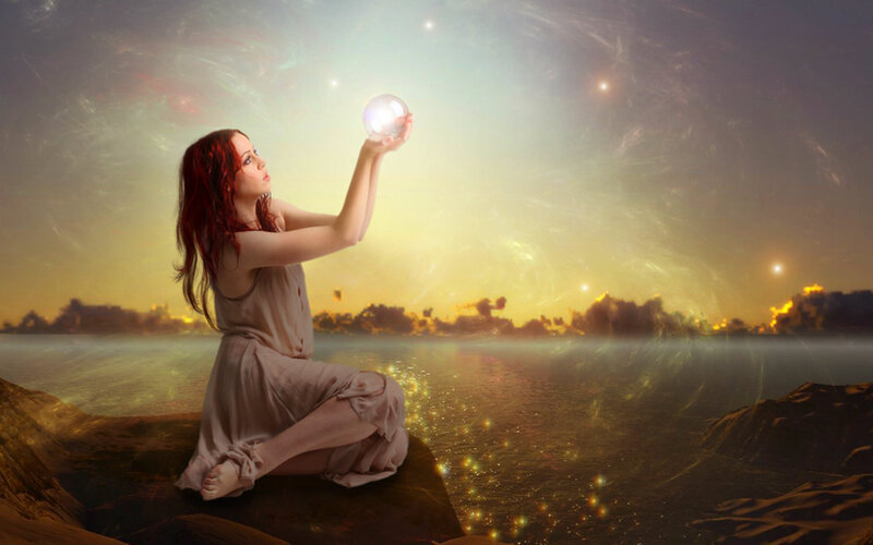 Woman Holding Glowing Orb — Gold