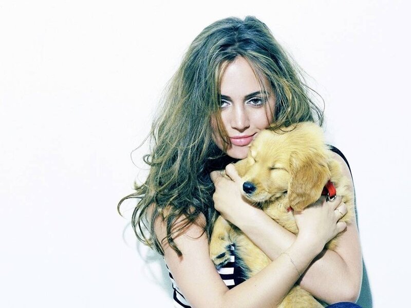 Woman Holding Golden Retriever Puppy — White, Calm