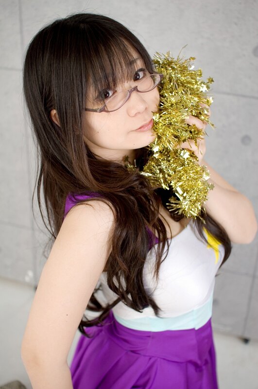 Woman holding golden tinsel