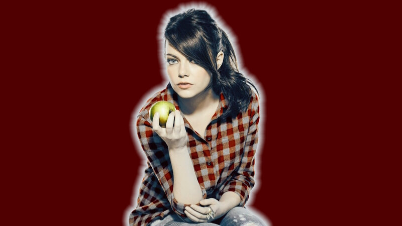 woman holding green apple