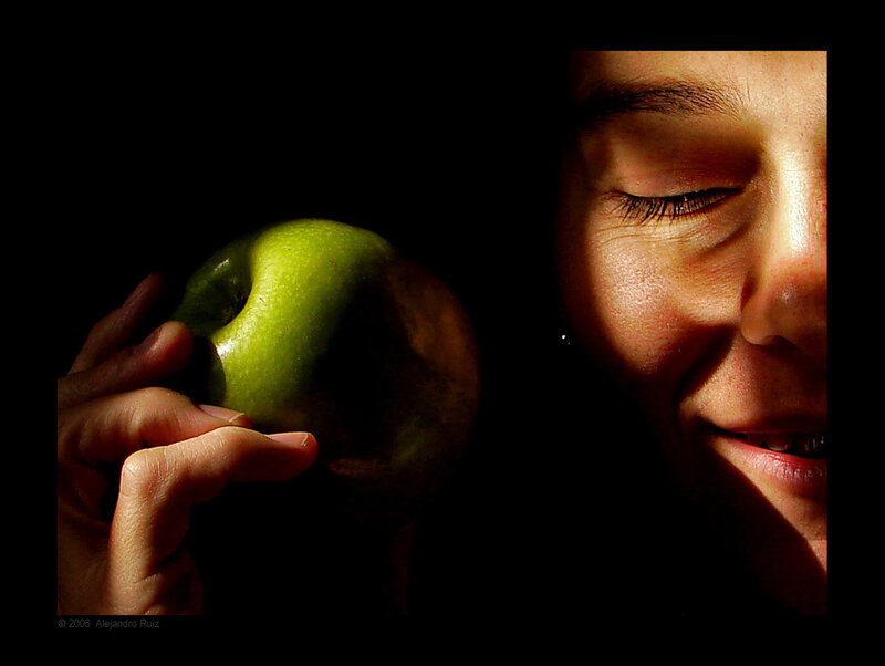 Woman Holding Green Apple — Dramatic, Photograph