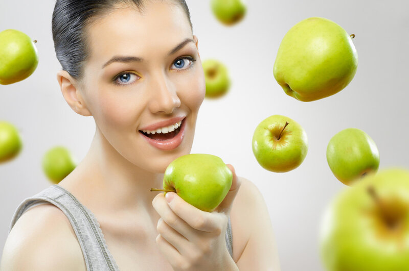 Woman Holding Green Apple — Happy
