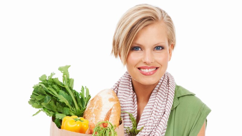 woman holding groceries