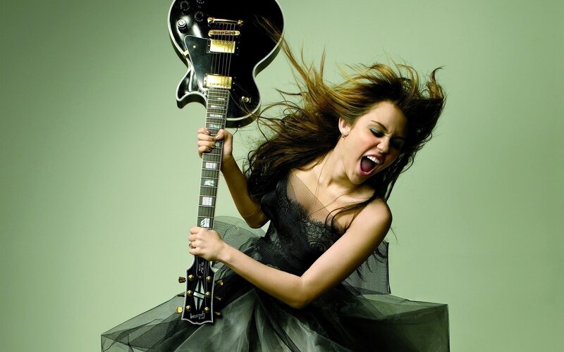 Woman Holding Guitar — Black, Energetic