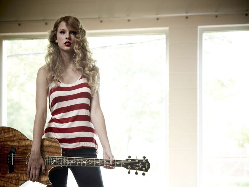 Woman Holding Guitar — Red, Confident