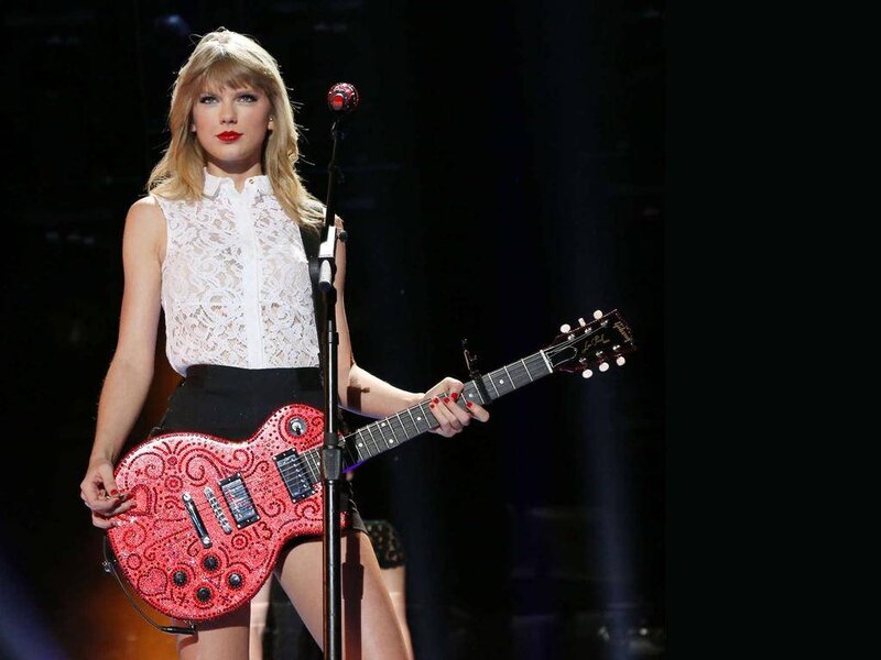 Woman Holding Guitar — Red, Performing