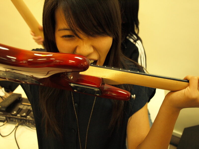 woman holding guitar