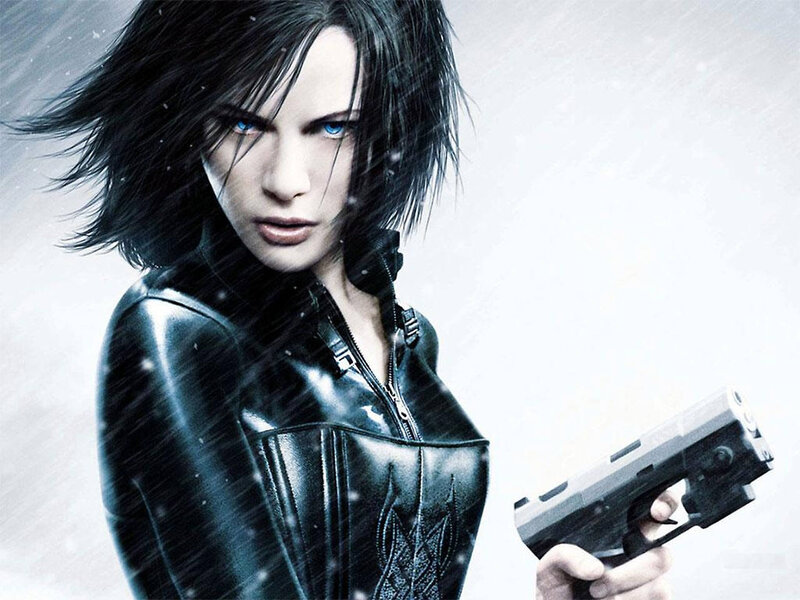 Woman Holding Gun — Black, Dramatic, Winter