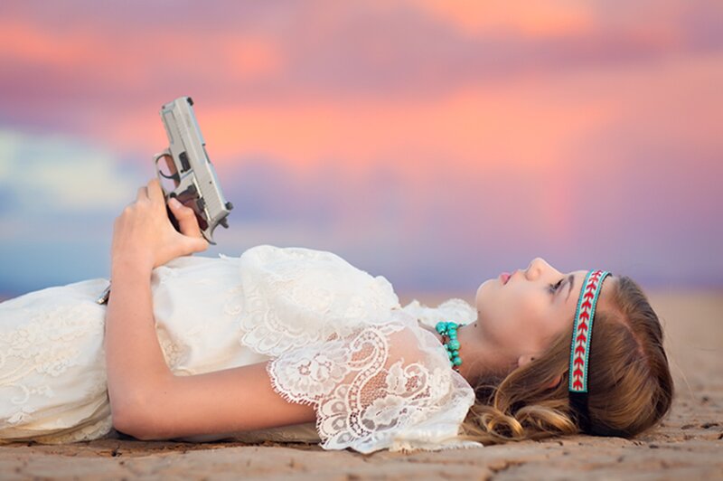 Woman Holding Gun — Pink